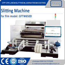 Plastic film slitting and rewind machine